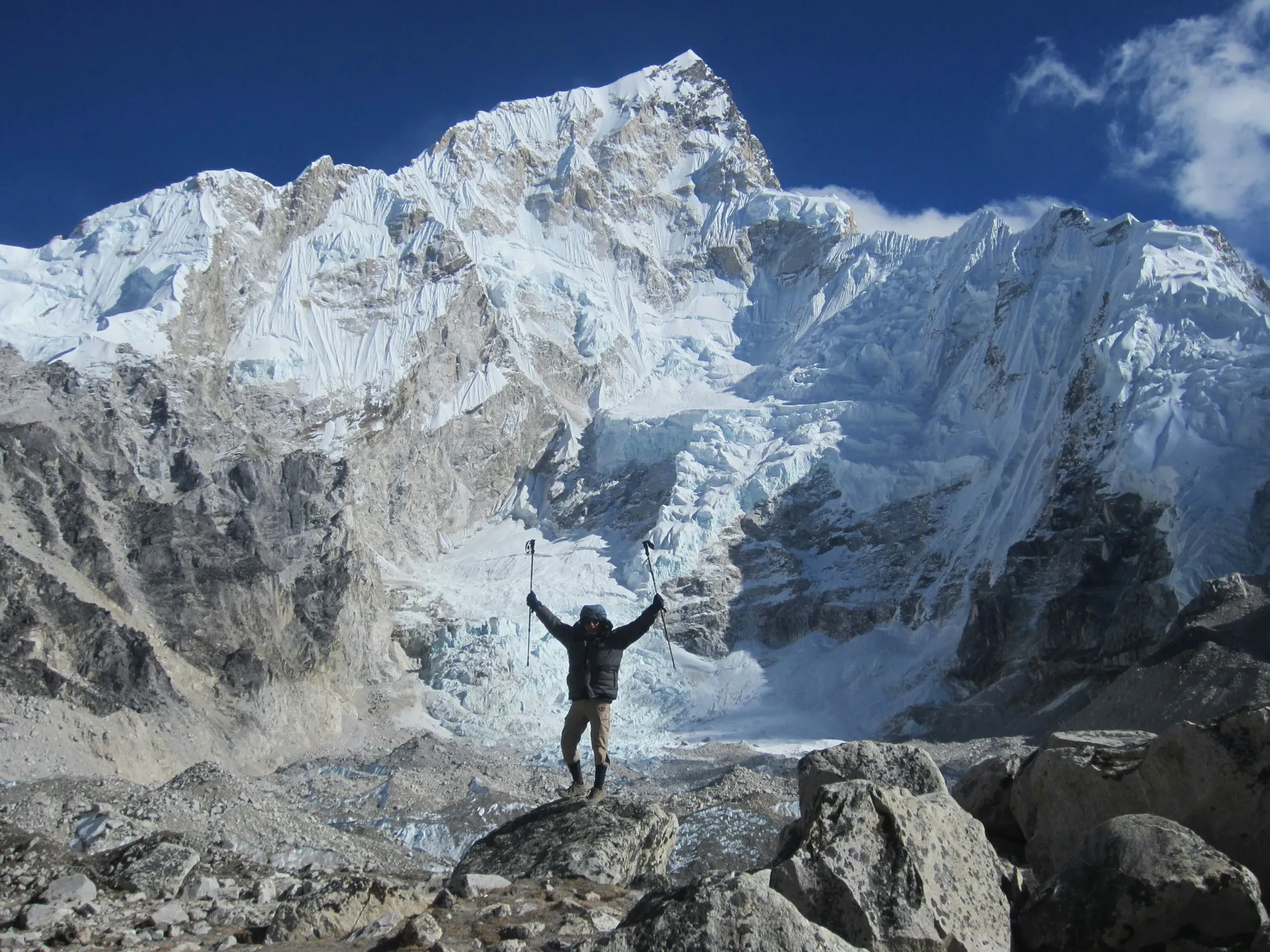 Trekker celebrating at Everest Base Camp